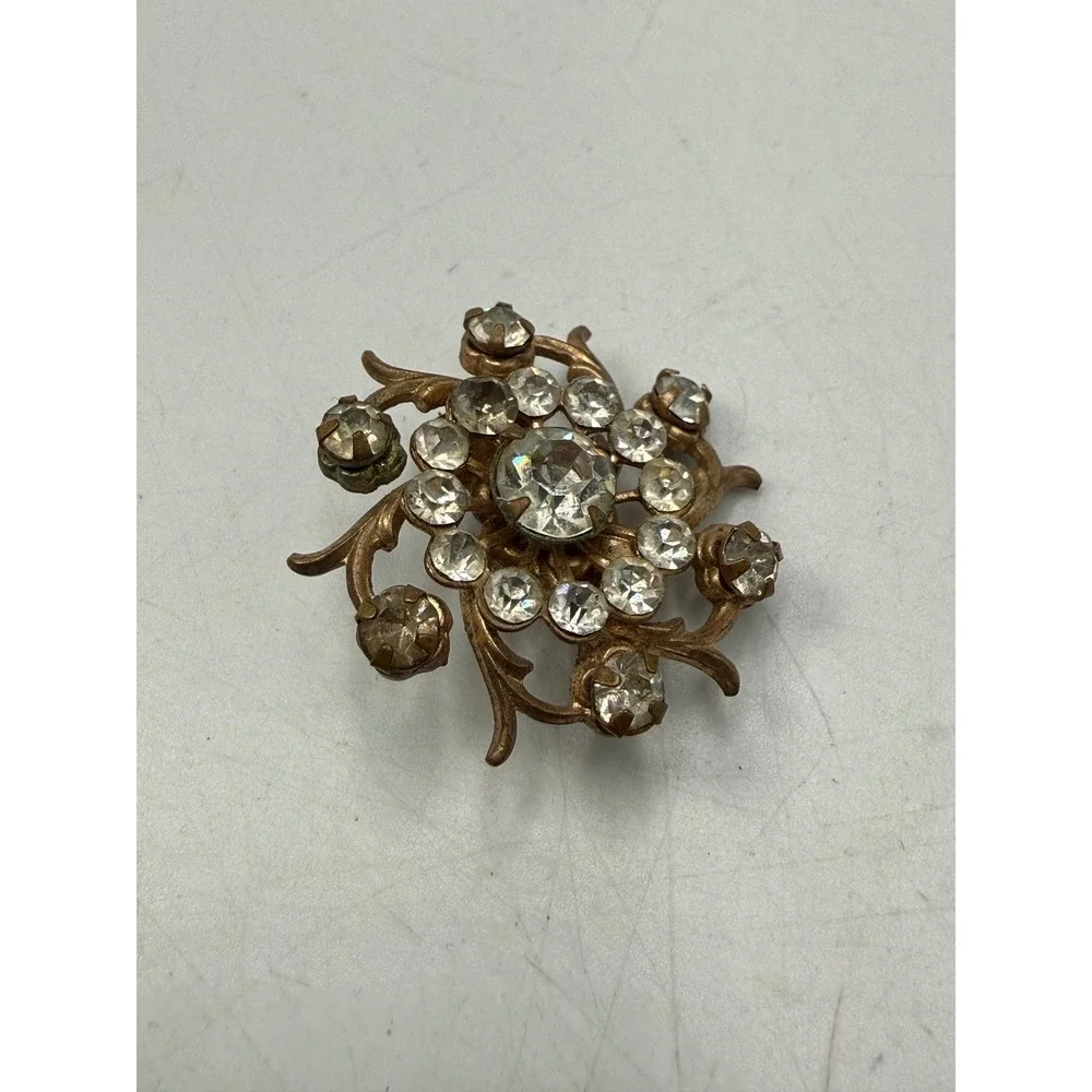 Vintage Gold Tone Clear Rhinestone Floral Sunburst Brooch Pin Round 1.25 Inch